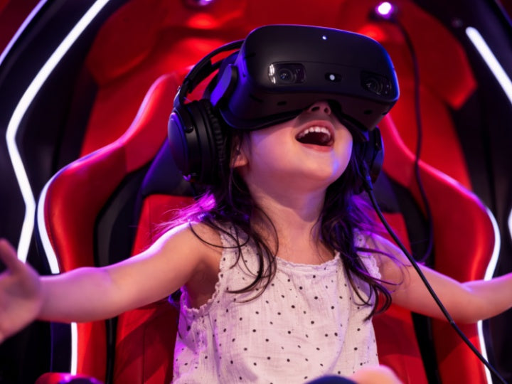Young girl laughing while enjoying VR virtual reality experience in Melbourne | family-friendly entertainment activity in Australia