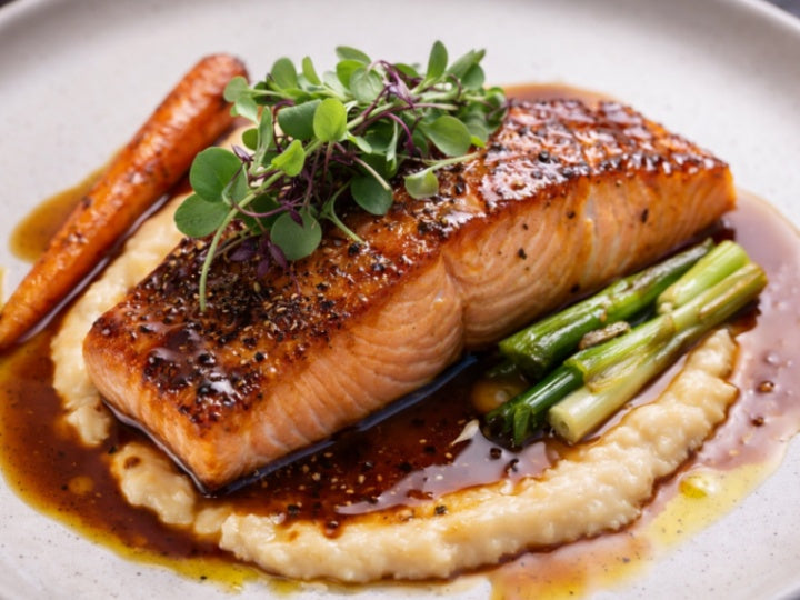 Pan-seared salmon fillet with puree and asparagus | premium seafood main course at a Melbourne fine dining restaurant