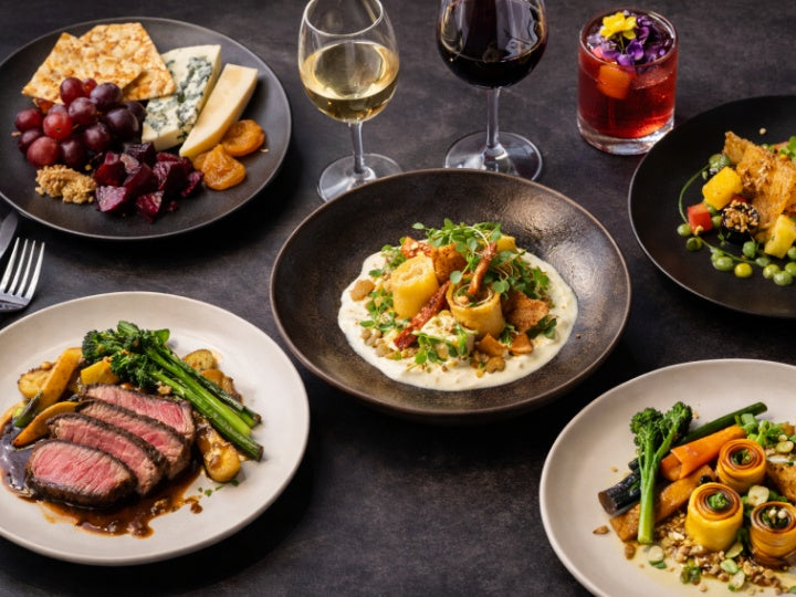 Assorted gourmet fine dining dishes with red and white wine | Australian fusion cuisine tasting menu in Melbourne