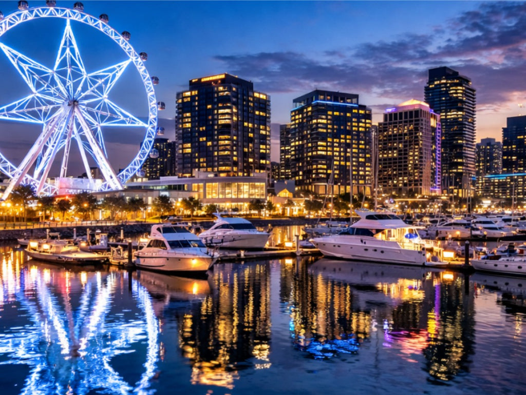 Melbourne Star Observation Wheel at Docklands, with luxury yachts and illuminated waterfront skyline at night, Victoria, Australia